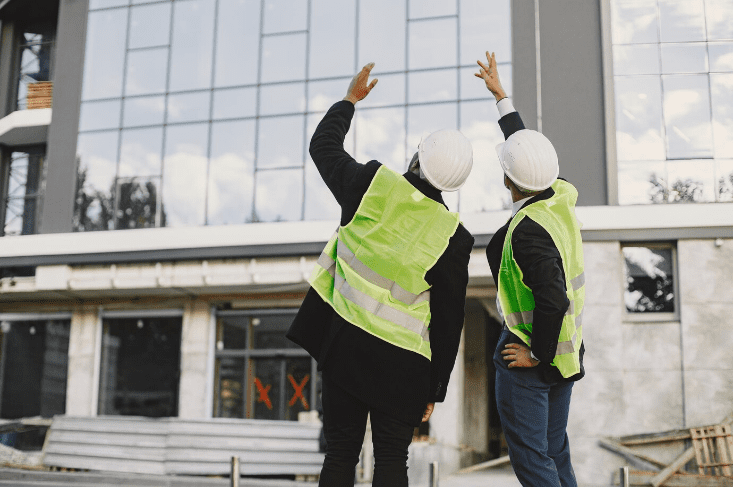 two people working on the construction